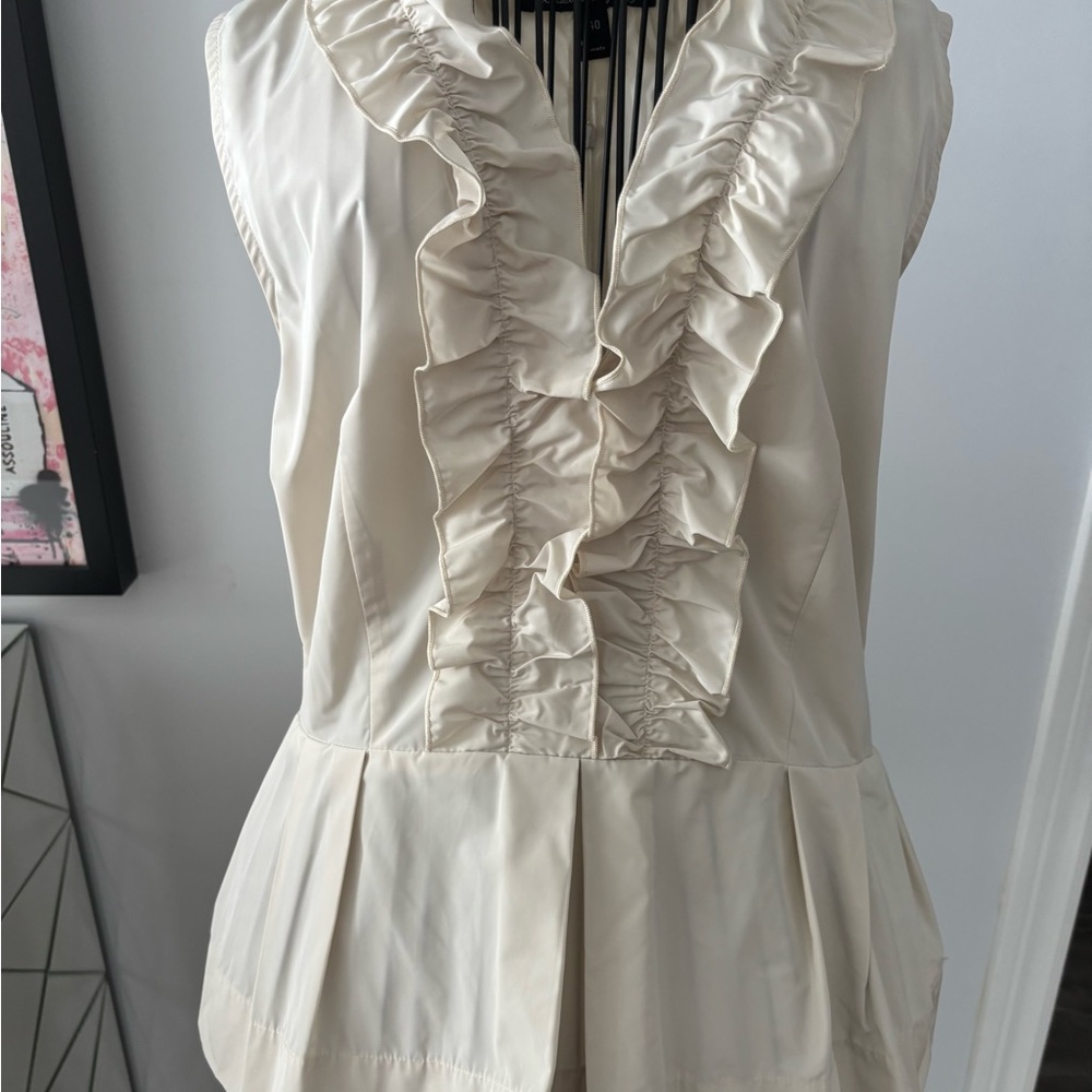 Sleeveless Ruffle Front Blouse in Cream